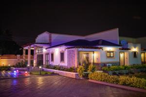a house at night with its lights on at Brynx Haven - Cape Coast in Cape Coast