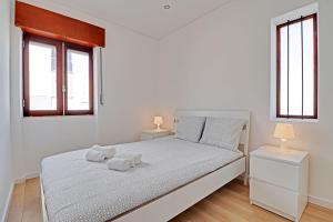 Tempat tidur dalam kamar di The Fig and Almond Houses