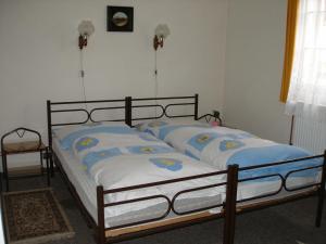 Een bed of bedden in een kamer bij Hotel RON