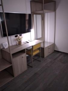 TV a/nebo společenská místnost v ubytování Rainbow Sweet Rooms