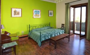 A bed or beds in a room at B&B Casa Degli Artisti