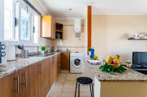 a kitchen with a sink and a dishwasher at Cactus in Puerto del Carmen