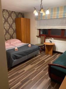 Łóżko lub łóżka w pokoju w obiekcie Victoria Rooms