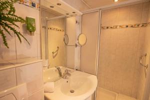 Kúpeľňa v ubytovaní Hotel Zimmerbräu