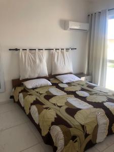 Кровать или кровати в номере Villa Vitoria