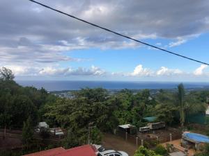 a view of the ocean from a resort at DUPLEX BOUGUAINVILLIER in Saint-Denis