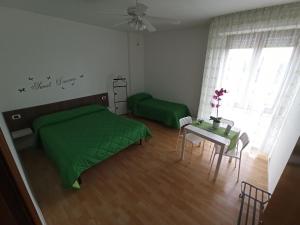 Posteľ alebo postele v izbe v ubytovaní Like Home Cisanello