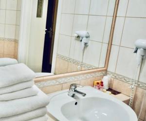 Kúpeľňa v ubytovaní Matejko Hotel