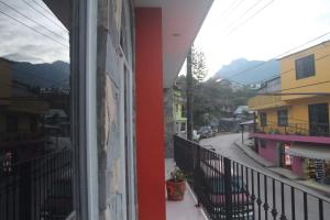 a view of a street from a window of a building at Bungalows de KQ in Xilitla