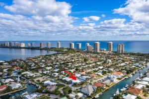 an aerial view of a city and the ocean at Beach Luxury, 4B- 3B Heated Pool, Infinity Spa, Cabana with Outdoor Kitchen and TV, BBQ, Golden Tee Arcade, Walk to Beach! Sleeps 10 in West Palm Beach