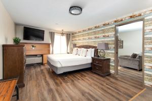 Postel nebo postele na pokoji v ubytování Stratford Inn