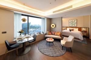 Posezení v ubytování Pan Pacific Serviced Suites Orchard, Singapore