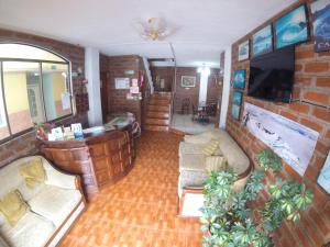 The lounge or bar area at Hostal Viajero's