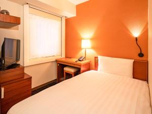 Llit o llits en una habitació de Comfort Inn Tokyo Roppongi