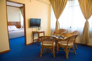 Katil atau katil-katil dalam bilik di Panorama Hotel