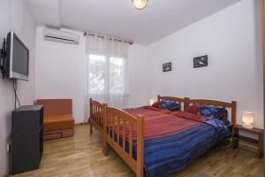 Posteľ alebo postele v izbe v ubytovaní Apartment Pavlovic