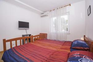 Posteľ alebo postele v izbe v ubytovaní Apartment Pavlovic