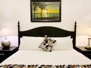 Postel nebo postele na pokoji v ubytování Chateau De Boracay