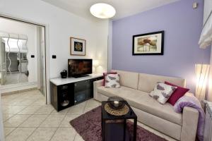 TV a/nebo společenská místnost v ubytování Apartments Lavizatic