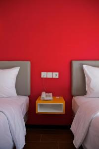 Krevet ili kreveti u jedinici u objektu Amaris Hotel Ambon