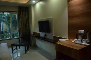 TV a/nebo společenská místnost v ubytování Hotel Sopan Heights