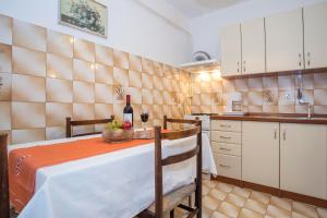 Kuchyňa alebo kuchynka v ubytovaní Apartment Puh