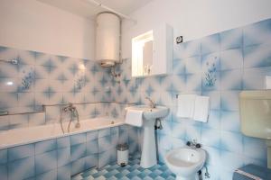 Kúpeľňa v ubytovaní Apartment Puh + 15 fotografií