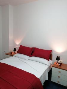 Postel nebo postele na pokoji v ubytování Le Residenze del Giglio