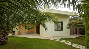 A garden outside Villa Erato - Your Dream Getaway in Sani Seaside