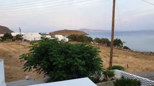 a view of the ocean from a house at Galazio Kyma in Agios Ioannis