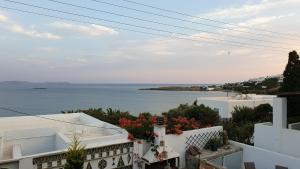 a view of the ocean from a building at Galazio Kyma in Agios Ioannis