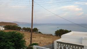 a view of the ocean from a house at Galazio Kyma in Agios Ioannis