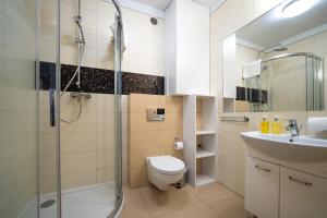 Kúpeľňa v ubytovaní RentPlanet - Apartamenty Górna Resorts