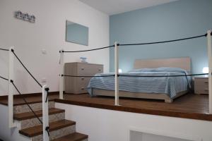 Un ou plusieurs lits dans un hébergement de l'établissement Appartamento a pochi metri dal mare Nenia