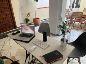 TV a/nebo společenská místnost v ubytování Casa de las Especias Hotel Boutique