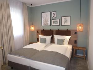 Postel nebo postele na pokoji v ubytování Hotel Witthus GmbH & CoKG