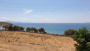 a view of the ocean from a hill at Galazio Kyma in Agios Ioannis