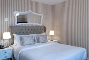 Cama ou camas em um quarto em Bella Gramado Resort & Spa by Gramado Parks