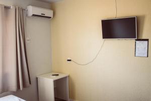 TV a/nebo společenská místnost v ubytování Hotel Colina
