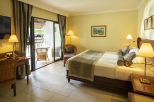 Postel nebo postele na pokoji v ubytování Maritim Resort & Spa Mauritius