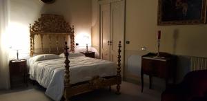 Postel nebo postele na pokoji v ubytování Villa Cagnola