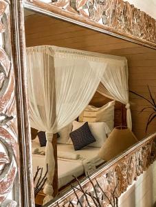 Voodi või voodid majutusasutuse Samura Maldives Guest House Thulusdhoo toas