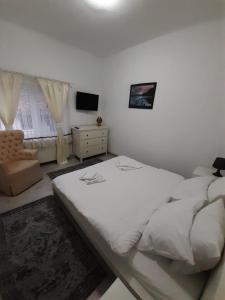 Postel nebo postele na pokoji v ubytování Casa Aurora