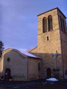 an old church with a cross on the side of it at Les Aubettes in Jumeaux