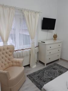 TV a/nebo společenská místnost v ubytování Casa Aurora