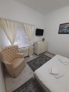 TV a/nebo společenská místnost v ubytování Casa Aurora