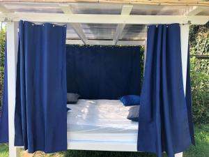 A bed or beds in a room at Agriturismo S.Ilario