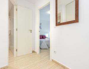 Posteľ alebo postele v izbe v ubytovaní Apart-rent Apartament Av Rhode 1º 2009