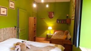 Cama o camas de una habitación en Les Chambres du Logis du Chatelier