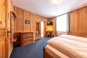 Llit o llits en una habitació de Hotel Filli